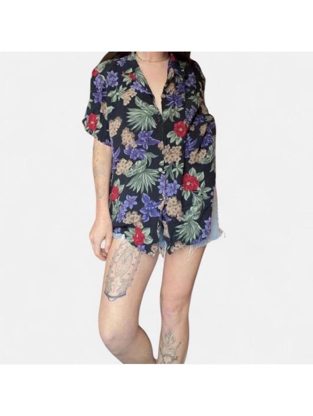 Super fun dark colored floral button down shirt.